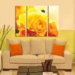 Картины в интерьере гостиной триптих в желто-оранжевом колорите