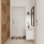 Шкаф с деревянными дверцами в белом коридоре