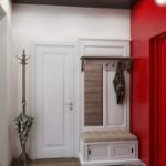 Открытая вешалка в коридоре с красной стеной