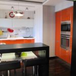 Оранжевый цвет в дизайне кухни