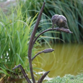 скульптуры для сада птицы